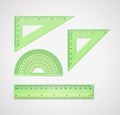 School supplies. Set of green plastic transparent plastic measuring tools Royalty Free Stock Photo