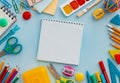 School supplies stationery on a blue background, back to school concept with copy space for text, flat lay, top view Royalty Free Stock Photo