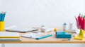 School supplies on a white table on the eve of the inauguration of a lesson