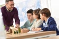 School teacher with pupils in science class Royalty Free Stock Photo