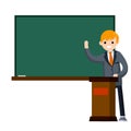 School teacher stands near blackboard. Royalty Free Stock Photo