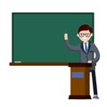 School teacher stands near blackboard. Royalty Free Stock Photo