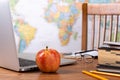 School Teachers Desk With World Map in Background Royalty Free Stock Photo