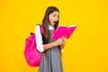 School teenager child girl with book and copybook. Teenager student, isolated background. Learning and knowledge. Go Royalty Free Stock Photo