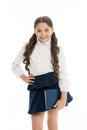 School textbook and stationery concept. Child school uniform smart kid happy hold textbook. Girl happy face carry