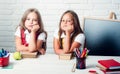 School time of girls. Back to school and home schooling. Friendship of small sisters in classroom at knowledge day Royalty Free Stock Photo