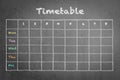 School timetable on black chalkboard background