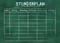 School timetable or class schedule on green chalkboard Royalty Free Stock Photo