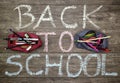 School tools on a wooden background.