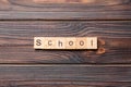 school word written on wood block. school text on cement table for your desing, concept