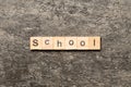 school word written on wood block. school text on cement table for your desing, concept