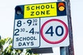 School zone road sign with speed limit 40 during before and after school hours in NSW, Australia. Road safety Royalty Free Stock Photo