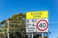 School zone road sign with speed limit 40 during before and after school hours in NSW, Australia. Road safety Royalty Free Stock Photo