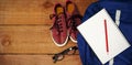 Schoolbag with apple and digital tablet on table Royalty Free Stock Photo