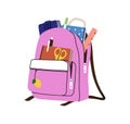 Schoolbag packed with school accessories. Backpack, kids bag full of stationery, pens, notebooks, books, ruler sticking Royalty Free Stock Photo