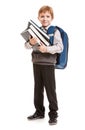 Schoolboy with backpack holding books Royalty Free Stock Photo