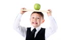 Schoolboy with book and apple Royalty Free Stock Photo