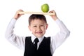 Schoolboy with book and apple Royalty Free Stock Photo