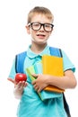 schoolboy with books showing a red apple for lunch on a white Royalty Free Stock Photo