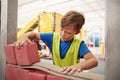 Schoolboy building with toy bricks at a science centre Royalty Free Stock Photo