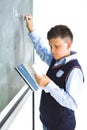 Schoolboy at the chalkboard Royalty Free Stock Photo