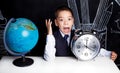 Schoolboy with a clock Royalty Free Stock Photo