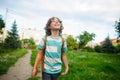 The schoolboy comes back from school in good mood. Royalty Free Stock Photo