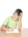 Schoolboy doing bored his homework Royalty Free Stock Photo