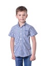 Schoolboy in fashionable blue checkered shirt on white background