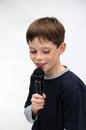 Schoolboy giving a performance and entertains the people