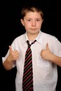 Schoolboy giving thumbs up