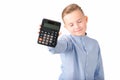 Schoolboy holding calculator. Portrait of funny cute 10s boy close eyes.White background