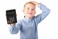 Schoolboy holding calculator. Portrait of funny cute 10s boy touching his head with hand.White background