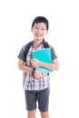 Schoolboy holding notebook and smiling over white Royalty Free Stock Photo