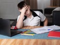 Schoolboy looking frustrated and tired while doing homework Royalty Free Stock Photo