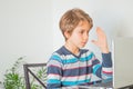 A schoolboy for online learning in front of computer