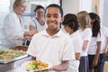Schoolboy in a school cafeteria Royalty Free Stock Photo
