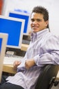 Schoolboy sitting in front of a computer Royalty Free Stock Photo