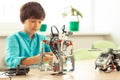 Schoolboy sitting at his school science lesson.