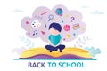 Schoolboy sitting on open book. Concept of back to school, education. Boy thinks about stationery, supplies and learning Royalty Free Stock Photo