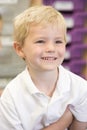 Schoolboy sitting in primary class Royalty Free Stock Photo