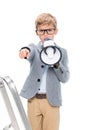 Schoolboy on stepledder with loudspeaker Royalty Free Stock Photo