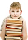 Schoolboy teenager studying holding tutorials books Royalty Free Stock Photo