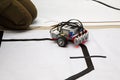 Schoolboy testing the robot at robotics competitions.