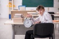 Male pupil in time management concept Royalty Free Stock Photo