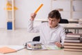 Male pupil in time management concept Royalty Free Stock Photo