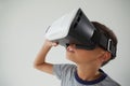 Schoolboy using virtual reality headset Royalty Free Stock Photo