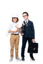 schoolboys in costumes of architect and lawyer looking at camera