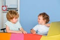 Schoolboys in preschool. Children pupils at school. Cheerful smiling little pupil having fun against blackboard. Child Royalty Free Stock Photo