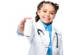 schoolchild in costume of doctor showing bottle of pills Royalty Free Stock Photo